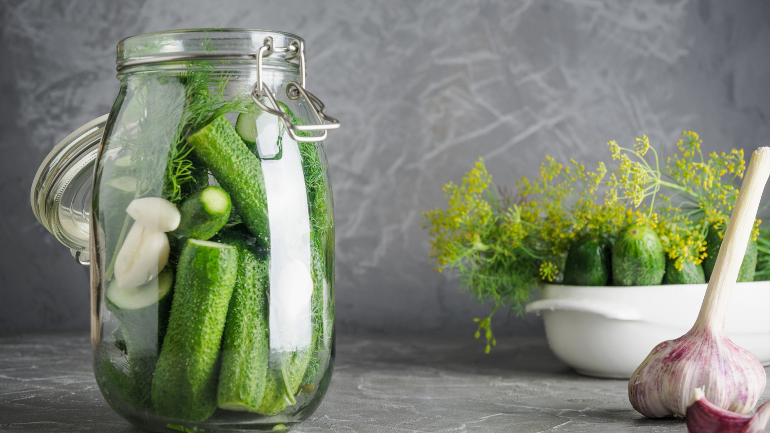 Fresh Cucumbers And Garlic In Fermentation Brine