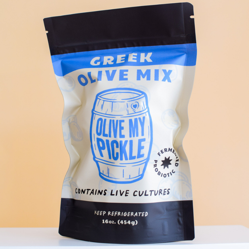 Greek Olive Mix by package with blue label featuring green olives