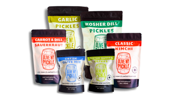 Variety of pickle flavors. The image displays six different pickle flavors, each with a distinct label and packaging