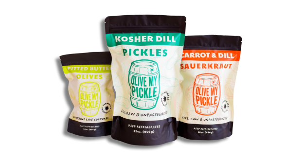 Pickles, sauerkraut, and pickle juice. Three packages of pickles. One package of sauerkraut. One package of pickle juice.