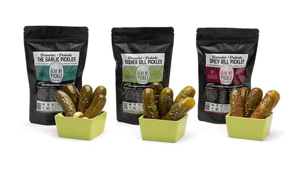 3 Pack of pickles in bowls front of their packaging