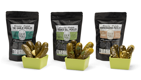 3 Pack of pickles in bowls front of their packaging